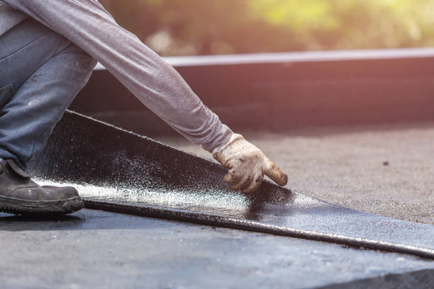 Professional Basement Waterproofing technician working in Vermontville, MI
